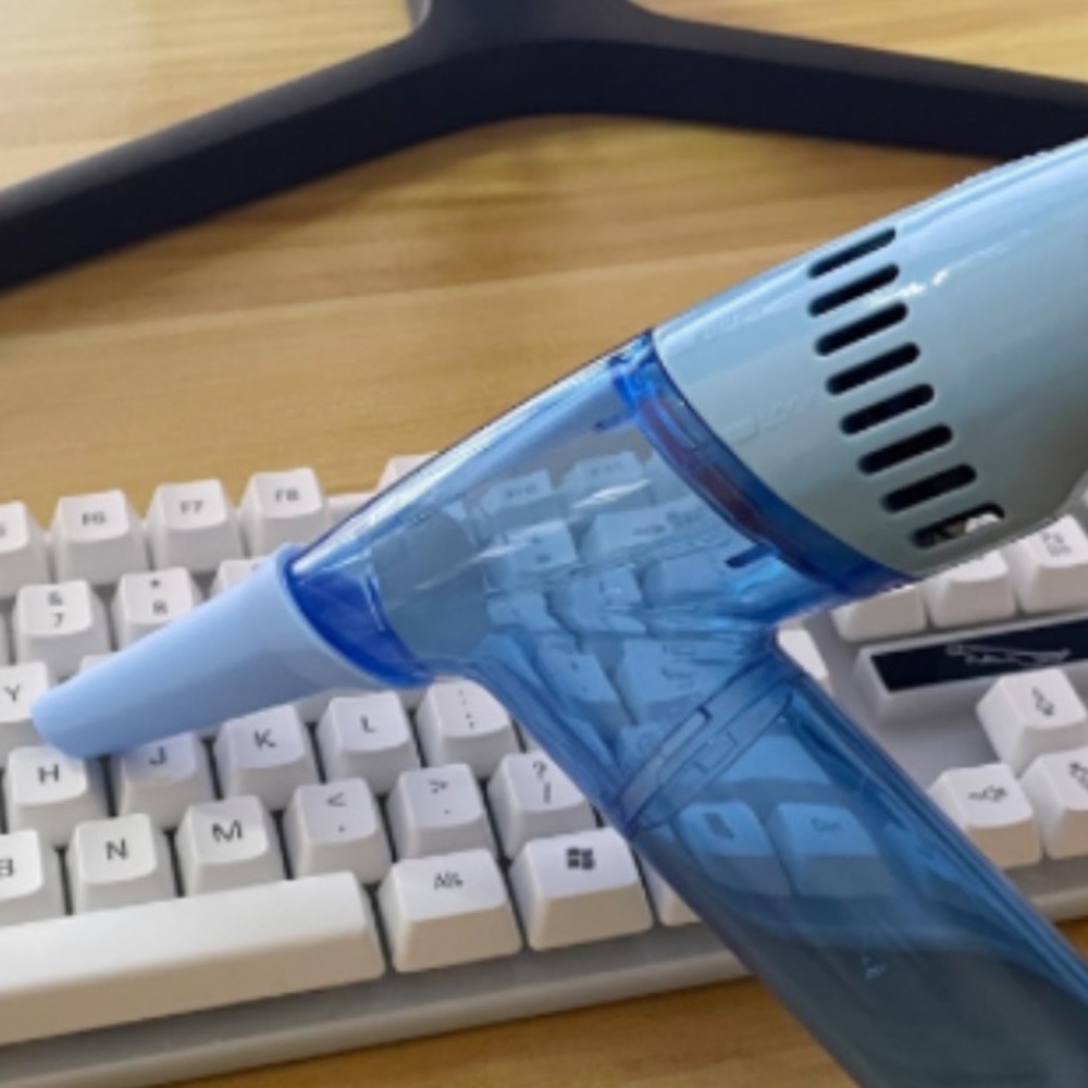 Compact Handheld Vacuum in Light Blue